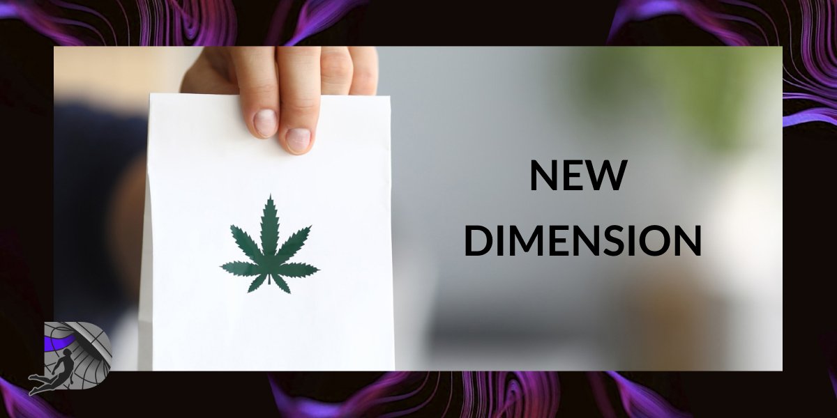 Person holding a white paper bag with a green cannabis leaf logo